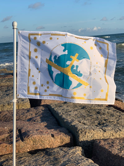 the flag in the wind on the ocean